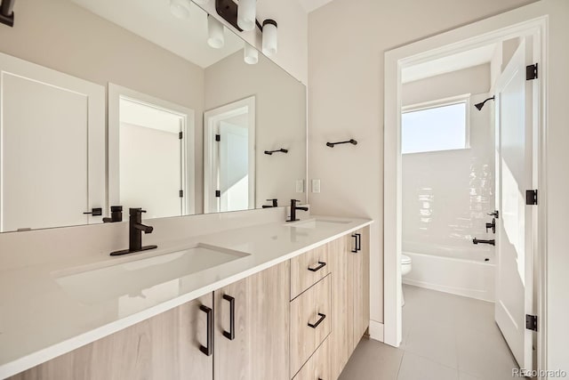 full bathroom with tile patterned flooring, vanity, bathtub / shower combination, and toilet