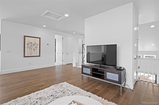 living room with dark hardwood / wood-style floors