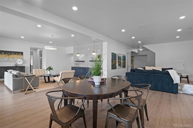 dining space featuring light hardwood / wood-style flooring