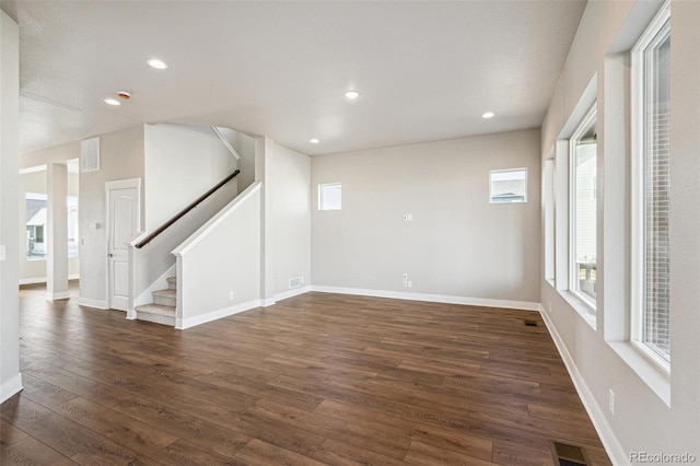 21295 E 61st Dr, Aurora, CO 80019 - interior space featuring baseboards, recessed lighting, stairs, and dark wood-style flooring