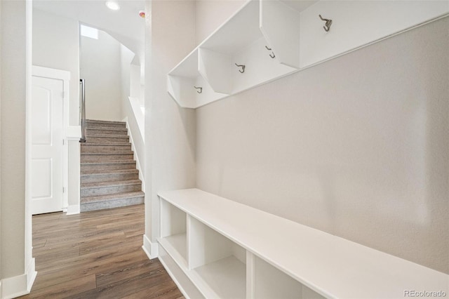 21295 E 61st Dr, Aurora, CO 80019 - mudroom featuring wood finished floors and baseboards