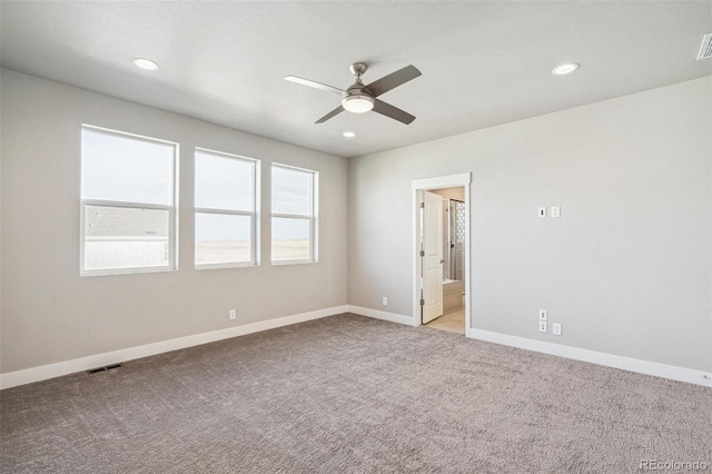 21295 E 61st Dr, Aurora, CO 80019 - empty room with visible vents, light carpet, baseboards, and ceiling fan