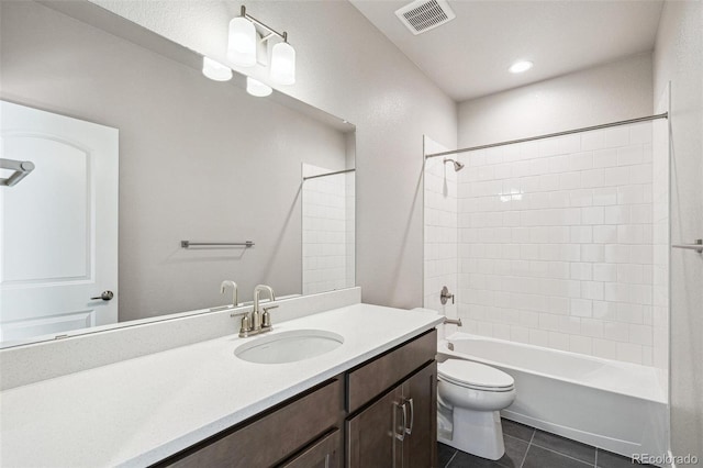 21295 E 61st Dr, Aurora, CO 80019 - bathroom with toilet, shower / bathing tub combination, visible vents, tile patterned flooring, and vanity