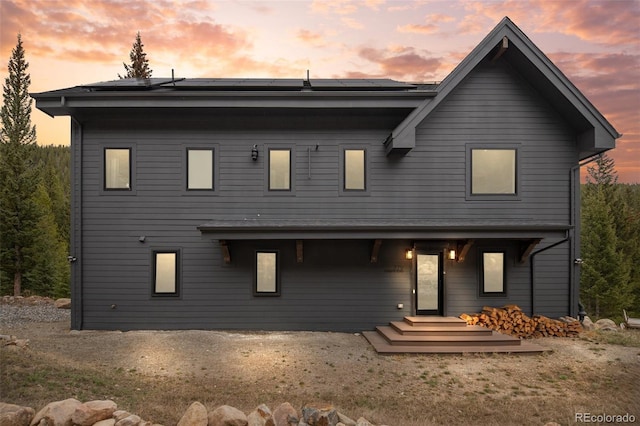 379 Rainbow Rd, Idaho Springs, CO 80452 - view of front facade with roof mounted solar panels