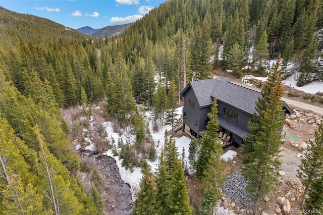 379 Rainbow Rd, Idaho Springs, CO 80452 - aerial view of property and surrounding area with a forest and mountains