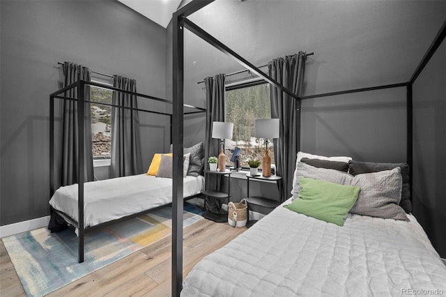 379 Rainbow Rd, Idaho Springs, CO 80452 - bedroom featuring wood finished floors and multiple windows
