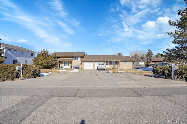 ranch-style home with a garage