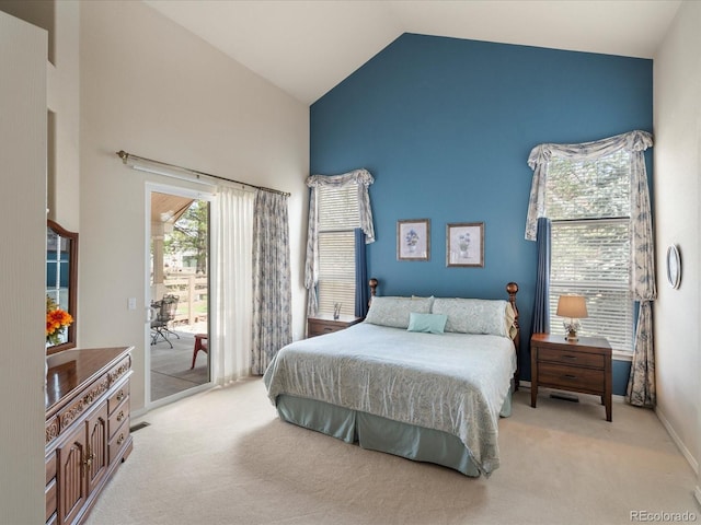 7158 W Belmont Dr, Littleton, CO 80123 - carpeted bedroom with baseboards, access to outside, and high vaulted ceiling