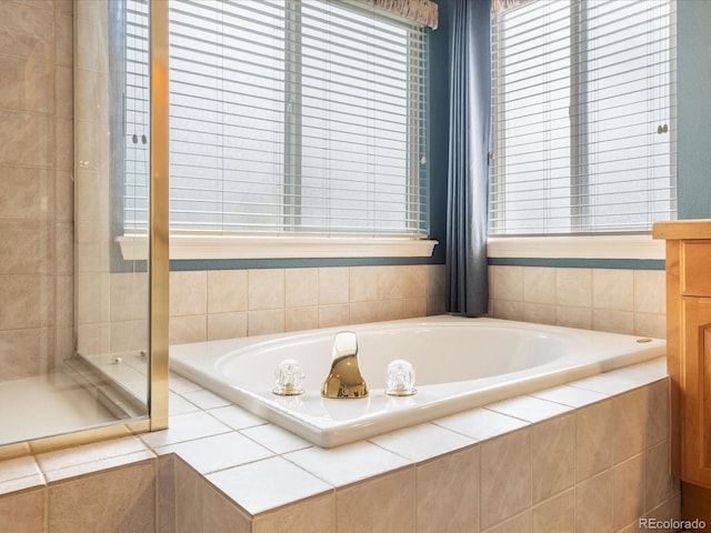 7158 W Belmont Dr, Littleton, CO 80123 - full bath with a stall shower and a bath