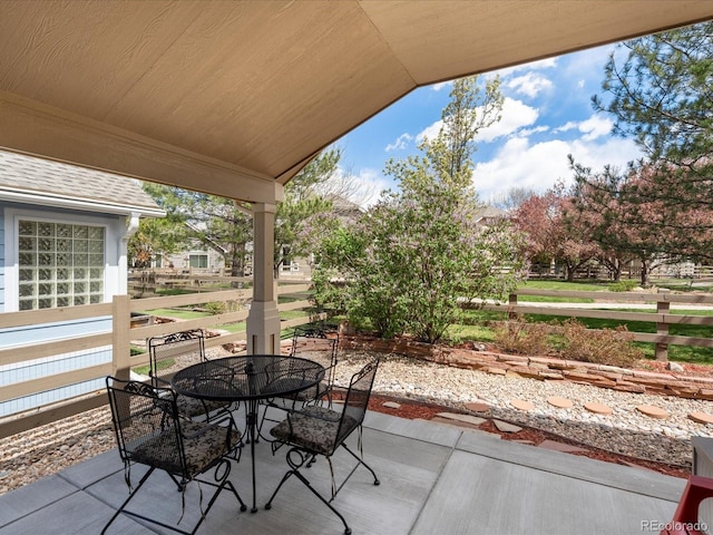 7158 W Belmont Dr, Littleton, CO 80123 - view of patio featuring outdoor dining area