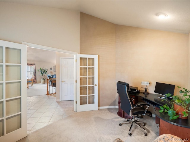 7158 W Belmont Dr, Littleton, CO 80123 - home office featuring carpet floors, high vaulted ceiling, french doors, and tile patterned floors