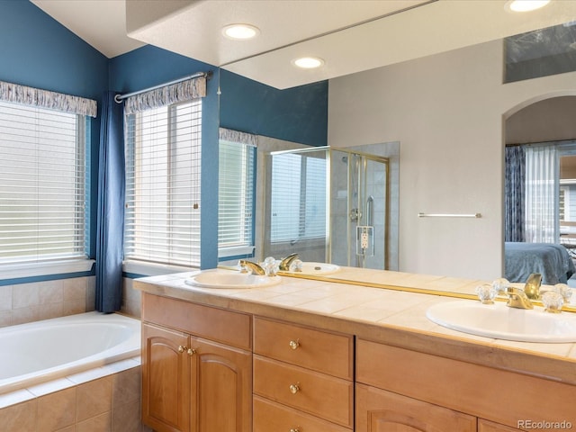 7158 W Belmont Dr, Littleton, CO 80123 - ensuite bathroom featuring a sink, a stall shower, ensuite bath, and double vanity