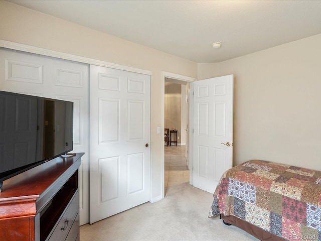 7158 W Belmont Dr, Littleton, CO 80123 - bedroom with light carpet and a closet