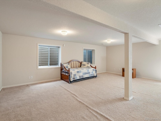 7158 W Belmont Dr, Littleton, CO 80123 - carpeted bedroom with baseboards and a textured ceiling