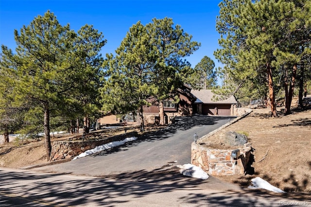 view of front of house with aphalt driveway