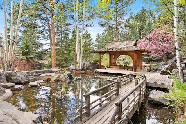 2851 Interlocken Dr, Evergreen, CO 80439 - view of home's community with a gazebo and a garden pond