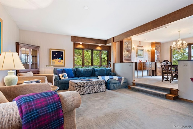 2851 Interlocken Dr, Evergreen, CO 80439 - living area with a chandelier, carpet flooring, and plenty of natural light