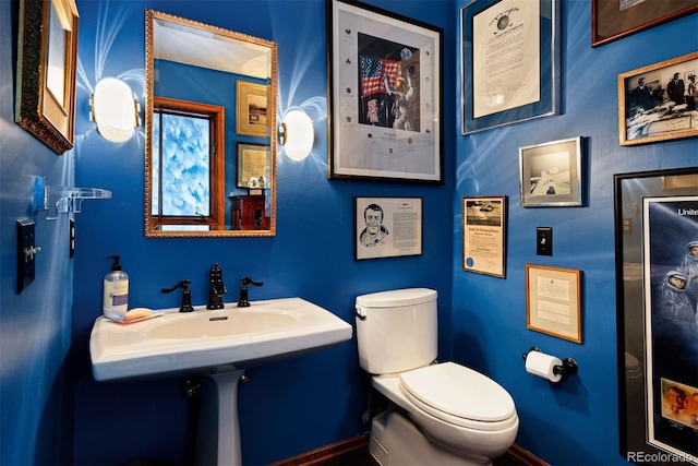 2851 Interlocken Dr, Evergreen, CO 80439 - half bath with toilet and baseboards