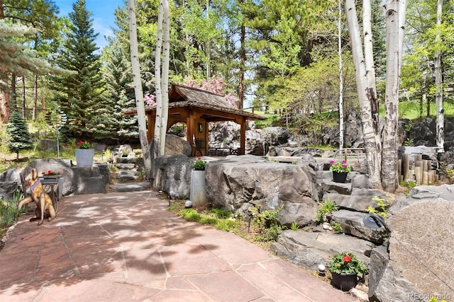 2851 Interlocken Dr, Evergreen, CO 80439 - view of patio / terrace with a gazebo