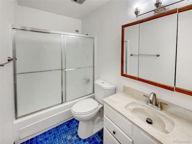 bathroom with visible vents, shower / bath combination with glass door, vanity, and toilet