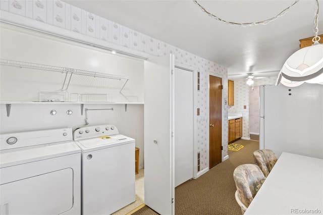 2043 Patrician Way, Colorado Springs, CO 80909 - laundry area with wallpapered walls, separate washer and dryer, baseboards, and carpet