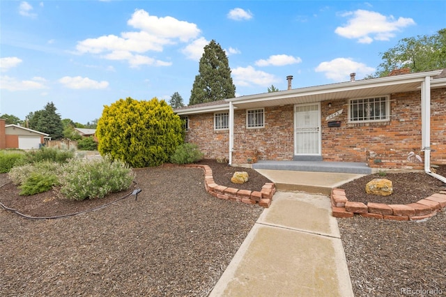 2043 Patrician Way, Colorado Springs, CO 80909 - view of front of property featuring brick siding