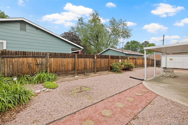 2043 Patrician Way, Colorado Springs, CO 80909 - fenced backyard with a patio area