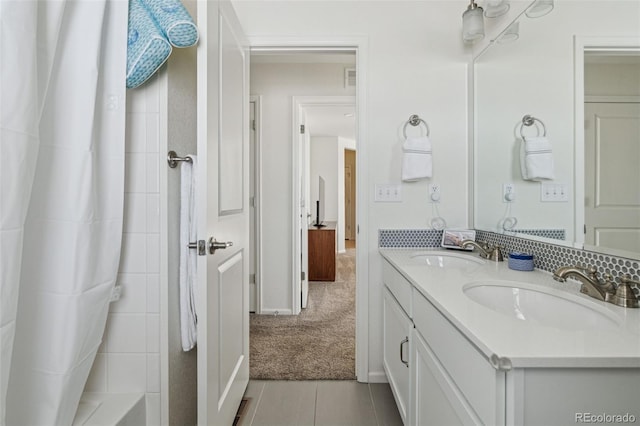 bathroom with vanity and a shower with curtain