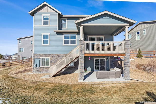 back of property with a patio and a yard