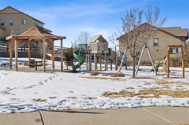 view of snow covered playground