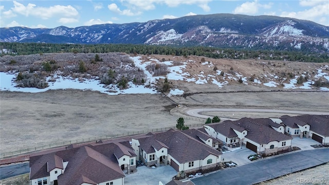 property view of mountains featuring a residential view