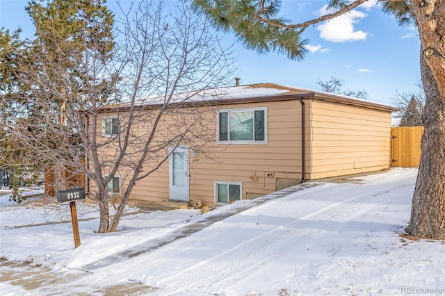 view of snow covered property