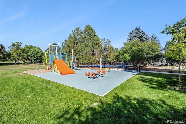 view of play area featuring a lawn