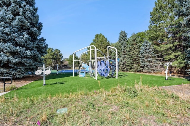 view of jungle gym featuring a yard