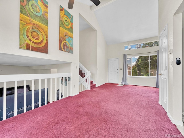 778 S Fairplay Ct, Aurora, CO 80012 - entryway featuring high vaulted ceiling, carpet flooring, a ceiling fan, beamed ceiling, and baseboards