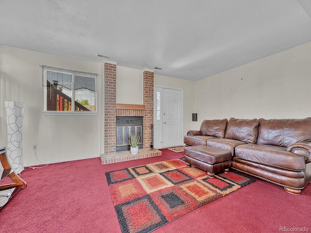 778 S Fairplay Ct, Aurora, CO 80012 - carpeted living area with a brick fireplace