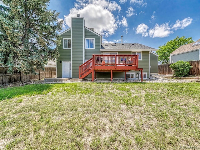 778 S Fairplay Ct, Aurora, CO 80012 - rear view of property with a deck, a chimney, and stairway