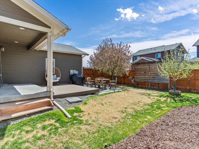 9378 E 60th Pl, Denver, CO 80238 - view of yard with a deck and a fenced backyard