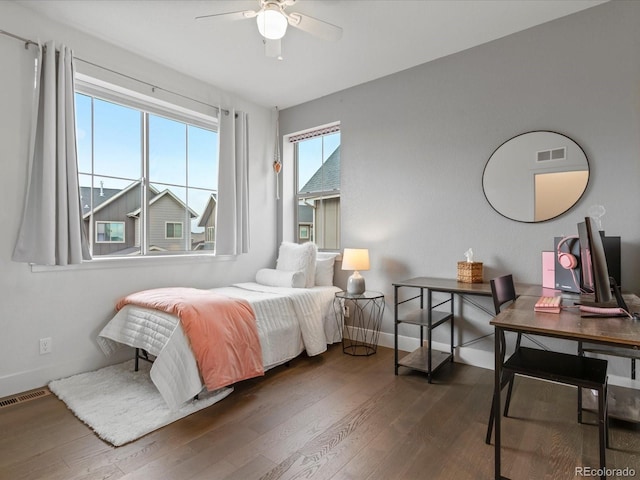 9378 E 60th Pl, Denver, CO 80238 - bedroom with baseboards, wood finished floors, and visible vents