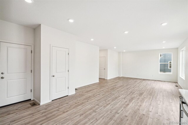 interior space with light hardwood / wood-style flooring