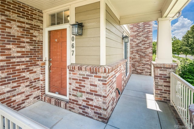 1067 Uinta Way Unit 1067, Denver, CO 80230 - entrance to property featuring a porch