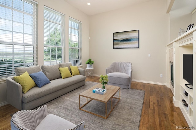 1067 Uinta Way Unit 1067, Denver, CO 80230 - living area featuring wood finished floors, a fireplace, and recessed lighting