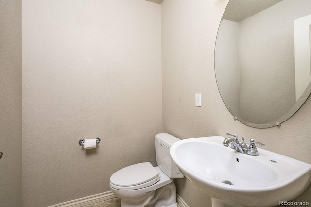 1067 Uinta Way Unit 1067, Denver, CO 80230 - bathroom featuring a sink and toilet