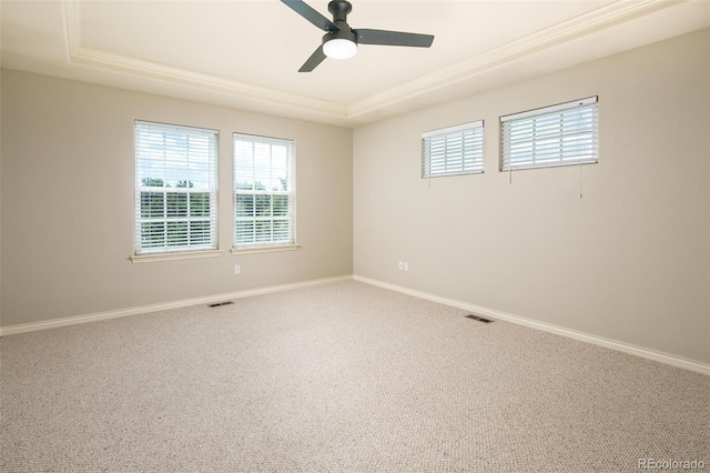 1067 Uinta Way Unit 1067, Denver, CO 80230 - carpeted empty room with a raised ceiling, ceiling fan, and crown molding