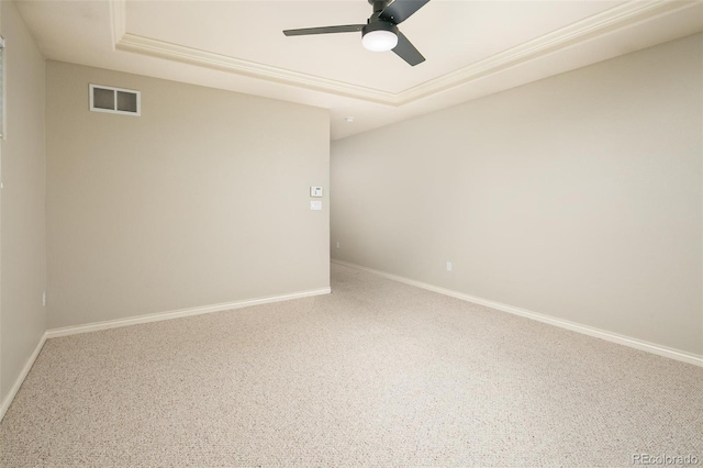 1067 Uinta Way Unit 1067, Denver, CO 80230 - unfurnished room featuring a tray ceiling, ceiling fan, and carpet