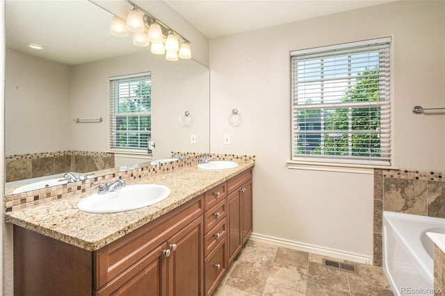 1067 Uinta Way Unit 1067, Denver, CO 80230 - full bath with double vanity and a bath