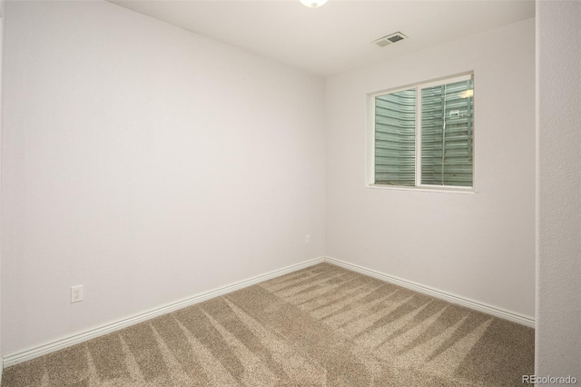 1067 Uinta Way Unit 1067, Denver, CO 80230 - spare room with carpet and baseboards