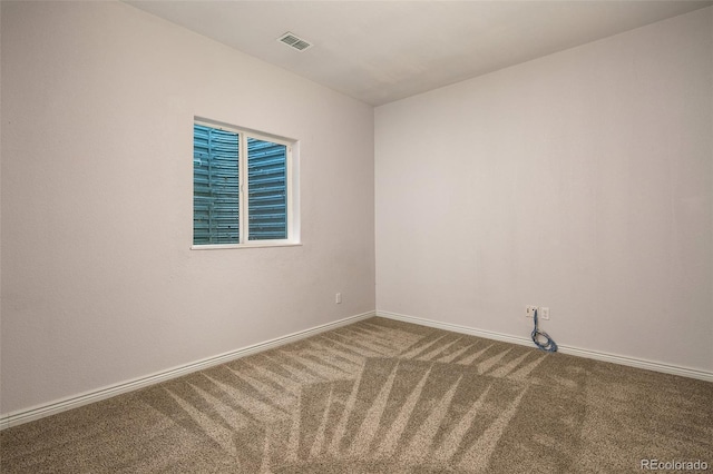 1067 Uinta Way Unit 1067, Denver, CO 80230 - spare room featuring carpet flooring and baseboards