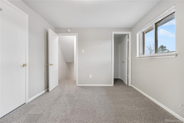 unfurnished bedroom featuring carpet