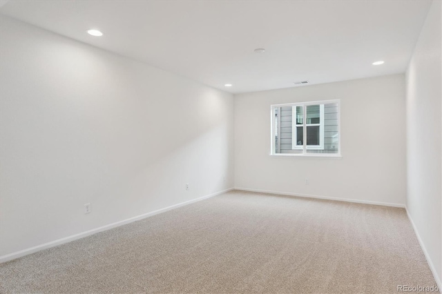 8205 Cokedale Cir, Littleton, CO 80125 - empty room with light carpet, baseboards, and recessed lighting